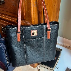 Dooney and Bourke tote purse. Brand new. Never used.